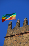 Gondar, Amhara Region, Ethiopia: Royal Enclosure - Fasiladas' Palace - Ethiopian flag on the central tower - photo by M.Torres