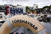 Trshavn, Streymoy island, Faroes: lifebuoy in the and the east harbour, Eystaravg - Trshavnar - Tinganes in the background - photo by A.Ferrari