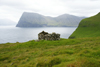 Trllanes, Kalsoy island, Noroyar, Faroes: ruin and view over Kunoy island - photo by A.Ferrari