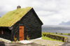 Elduvik village, Eysturoy island, Faroes: Black house with turfed roof - photo by A.Ferrari
