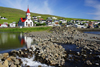 Sandavgur, Vgar island, Faroes: the village and its red roofed wooden church built in 1917 - photo by A.Ferrari