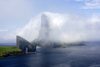 Vgar island, Faroes: Dranganir sea stacks and Tindholmur islet under a blanket of clouds - photo by A.Ferrari