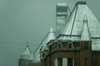 Finland - Helsinki, Punavuori area, buildings in the mist - metal roofs - photo by Juha Sompinmki