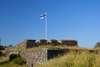 Helsinki, Finland: Finnish flag at Suomenlinna sea fortress - UNESCO World Heritage Site - photo by A.Ferrari