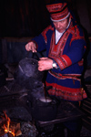 Finland - Lapland - Sami man in a kota tent preparing coffee - Arctic images by F.Rigaud