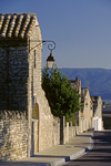 Gordes, Vaucluse, PACA, France: stone houses and street lamps  village street - photo by C.Lovell