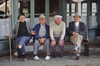 Vaucluse, PACA, France: four elderly Frenchman share a park bench - photo by C.Lovell