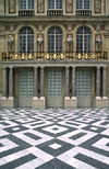 Versailles, Yvelines, le-de-France, France: Palace of Versailles, the pleasure palace of Louis XIV, the Sun King - decorated architecture and black and white mosaics - photo by C.Lovell