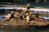 Versailles, Yvelines dpartement, France: Palace of Versailles / Chteau de Versailles - harvest - sculpture in a fountain - photo by Y.Baby
