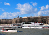 Paris, France: Seine river - boat going upstream in front of the Bateaux Mouches station, Port de la Confrence and Cours Albert 1er seen from Quai d'Orsay - 8e arrondissement - photo by M.Torres