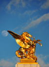 Paris, France: Pont Alexandre III - the moon and the equestrian sculpture of Pegasus held by the Fame of Combat / Commerce, La Renomme au Combat / Commerce - sculptor Pierre Granet - left bank - photo by M.Torres