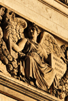 Paris, France: Arc de Triomphe - Place Charles de Gaulle - archangel with shield listing battles - Marengo, Rivoli, Arcole, Lodi - attic above the frieze - photo by M.Torres
