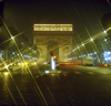 Paris, France: lights with starburst effect and horse-chestnut trees along Avenue des Champs-lyses - nocturnal view of the Arc de Triomphe - 8th arrondissement - photo by J.Fekete