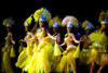 Papeete, Tahiti, French Polynesia: group of Tahitian dancers in ethnic costumes on stage - photo by D.Smith