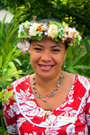 Papeete, Tahiti, French Polynesia: smiling Tahitian woman, wearing a flower garland - photo by D.Smith