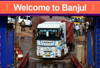 Banjul, The Gambia: a trucks struggles to board the ferry to Barra, across de river Gambia - photo by M.Torres