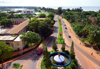 Gambia, Banjul: start of the Banjul Serrekunda Highway - Gambia High School, National Assembly and Tanbi wetlands on the left and the Atlantic Ocean on the right - seen from Arch 22 - photo by M.Torres