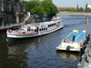 Berlin, Germany / Deutschland: tour boats on the river Spree - photo by M.Bergsma