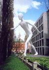 Germany - Bavaria - Munich / Mnchen: a giant among us - Walking Man sculpture, Jonathan Borofsky - Munich Re HQ, the worlds biggest reinsurance company - Mnchner Rck - modern art - sculpture - photo by M.Torres