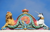 Gibraltar: the Royal Arms atop the Gibraltar courts service building - lion and unicorn - photo by M.Torres