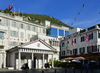 Gibraltar: Guard House of the residence of the Governor of Gibraltar and The Angry Friar pub on Convent Place, Main Street - cable car in the backround - photo by M.Torres