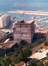 Gibraltar: the Union Jack over an old Arab bastion - Tower of Homage - Moorish Castle - photo by Miguel Torres