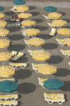 Greece, Rhodes, New Town:beach umbrellas form geometric patterns on the beach of Rhodes' New Town - photo by P.Hellander