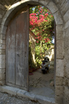 Greece, Dodecanese Islands,Rhodes: scooter in doorway of old house in Old Town - photo by P.Hellander