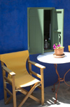 Greece, Dodecanese Islands,Rhodes: canvas chair against blue-painted wall - photo by P.Hellander