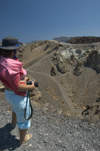 Greece, Cyclades, Santorini: a visitor (LPI photographer Stella Hellander) stares into the caldera inthe centre of Megali Kameni - photo by P.Hellander