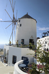 Greece, Cyclades, Santorini:restored windmill in clifftop village of Oia - photo by P.Hellander