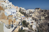 Greece, Cyclades, Santorini:the higgledy piggledy pattern of restored houses in Oia - photo by P.Hellander