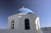 Greece, Cyclades, Santorini:the striking blue cupola of a church in Oia - photo by P.Hellander