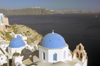 Greece, Cyclades, Santorini:the clifttop village of Oia overlooks the caldera - photo by P.Hellander