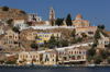 Greek islands - Dodecanese archipelago - Symi island - Symi town - houses and church on the waterfront - photo by A.Dnieprowsky