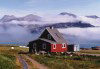 Greenland - Igaliko / Igaliku: farm house and white bails of grass for winter sheep feeding - photo by G.Frysinger