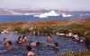 Greenland - Qaqortoq: land of contrasts - swimming in hot spring with icebergs in the sea (photo by G.Frysinger)