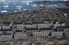 Greenland - Ilulissat / Jakobshavn - blocksof modern flats replaced timber houses - in the background the hospital and Disko bay - photo by W.Allgower