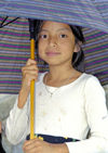 Guatemala - Lago de Atitln: umbrella girl (photo by A.Walkinshaw)