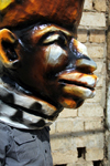 Bissau, Guinea Bissau / Guin Bissau: Cho de Papel Varela quarter, Carnival masks, profile of man with mask / Bairro Cho de Papel Varela, mscaras de Carnaval, preparao, homem com mscara - photo by R.V.Lopes