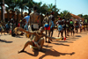 Bissau, Guinea Bissau / Guin Bissau: Amlcar Cabral Avenue, Carnival, young men to dance / Avenida Amilcar Cabral, carnaval, homens a danar - photo by R.V.Lopes