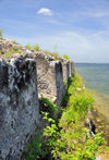 Fort-Libert, Nord-Est Department, Haiti: Fort Dauphin - northern battlement and the bay - crenellation - photo by M.Torres