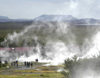 Iceland, Geyser: fumaroles and people fascinated by volcanism - photo by B.Cain