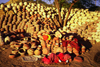 India - Rajasthan: woman sleeping in a front of a stock of pottery - photo by E.Petitalot
