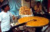 India - New Delhi: sweets like a giant paella (photo by Francisca Rigaud)