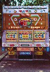 India - New Delhi: New Delhi: decorated rear end of a Tata truck - swastikas and blow horn sign (photo by Francisca Rigaud)