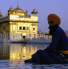 India - Amritsar (Punjab): Sikh man by the pond of the Golden temple - photo by W.Allgwer