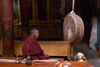 India - Ladakh - Jammu and Kashmir: Tikse gompa - monk and drum - photos of Asia by Ade Summers