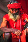 India - Allahabad, Uttar Pradesh: a sadhu begging - photo by E.Petitalot