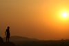 Hampi, Karnataka, India: man silhouette at sunset  - photo by M.Wright
